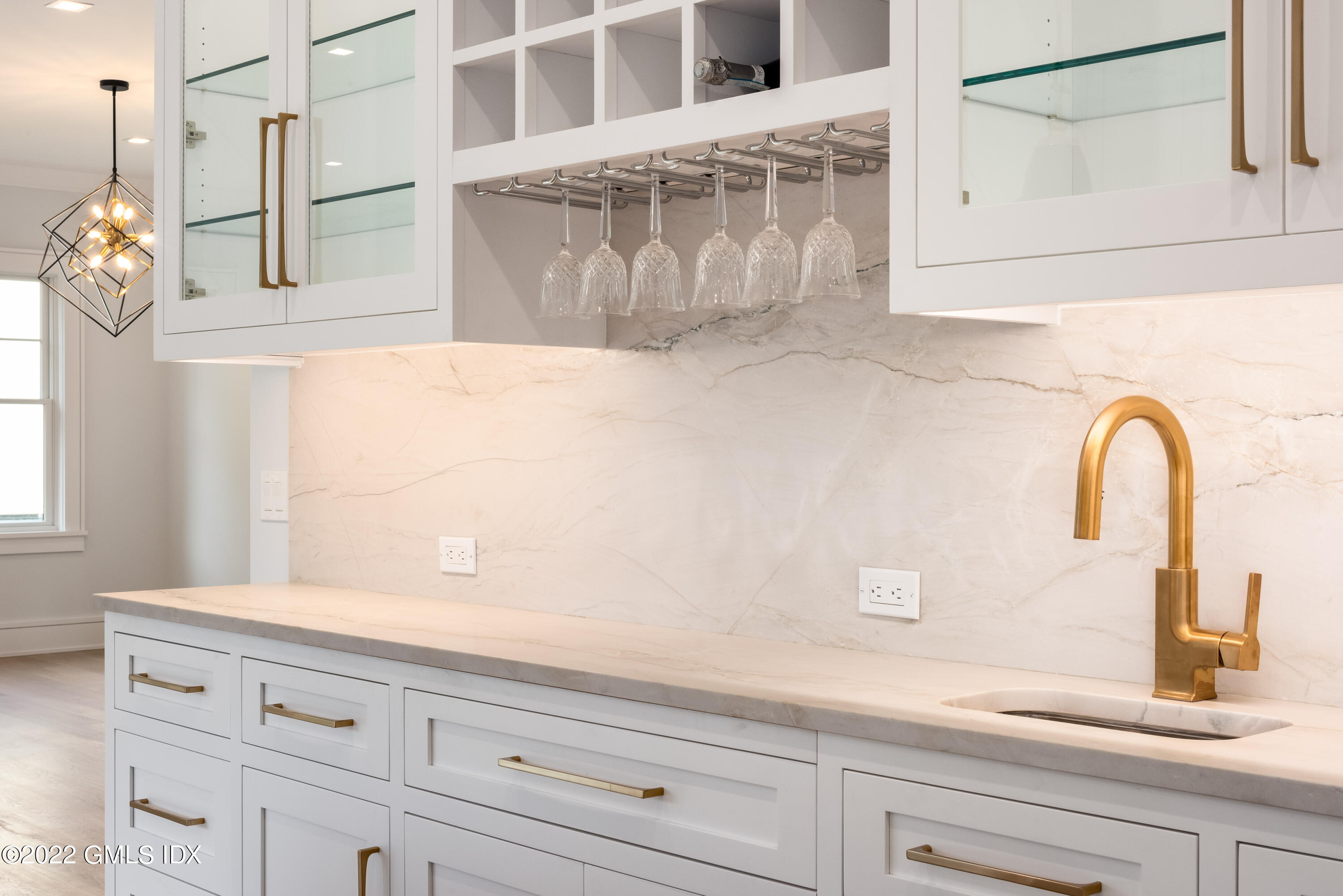 106 Sheep Hill Road Riverside, CT 06878 - Photo 21 of 53 a bathroom with a sink and a mirror