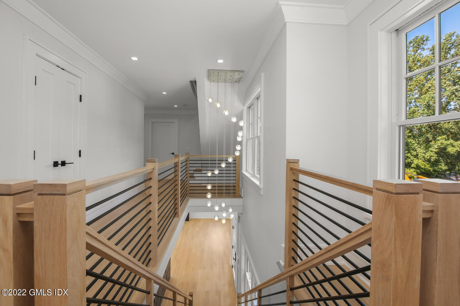 106 Sheep Hill Road Riverside, CT 06878 - Photo 27 of 53 a view of entryway and hall with wooden floor