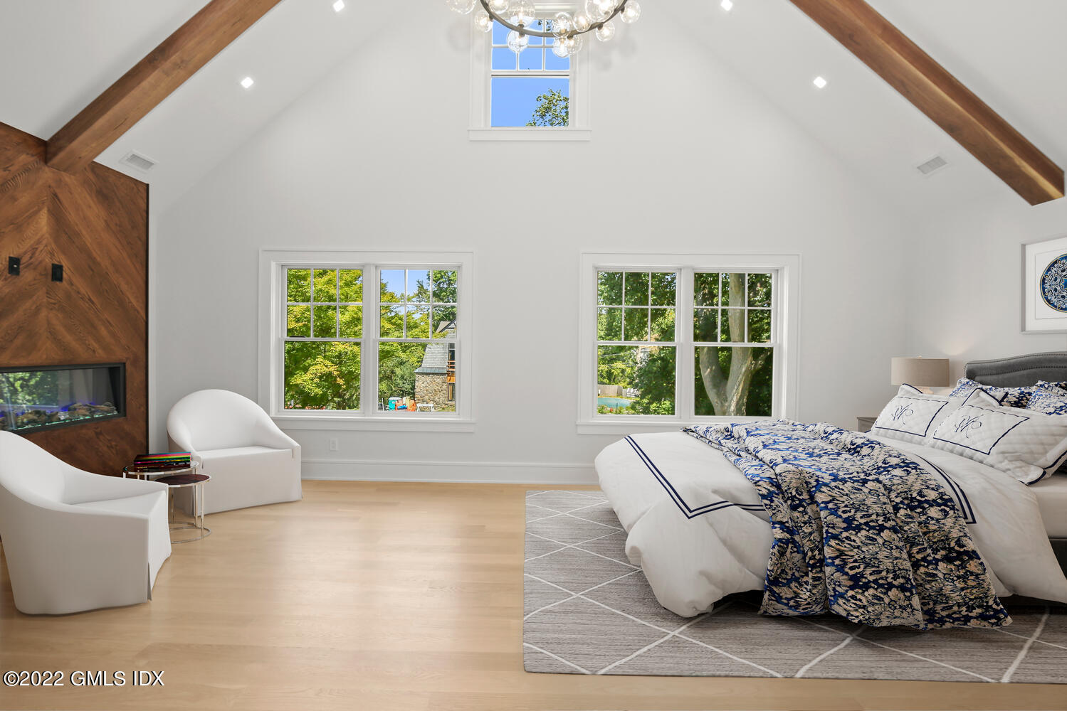 106 Sheep Hill Road Riverside, CT 06878 - Photo 29 of 53 a bed sitting in a bedroom next to a window