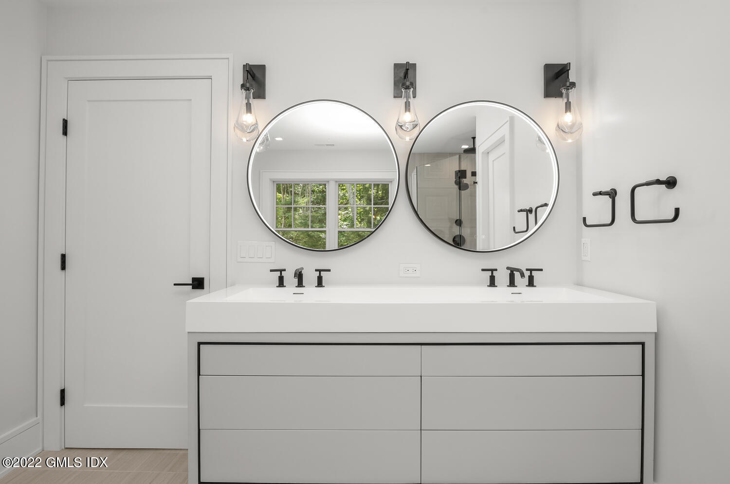 106 Sheep Hill Road Riverside, CT 06878 - Photo 31 of 53 a bathroom with 2 sink and a mirror