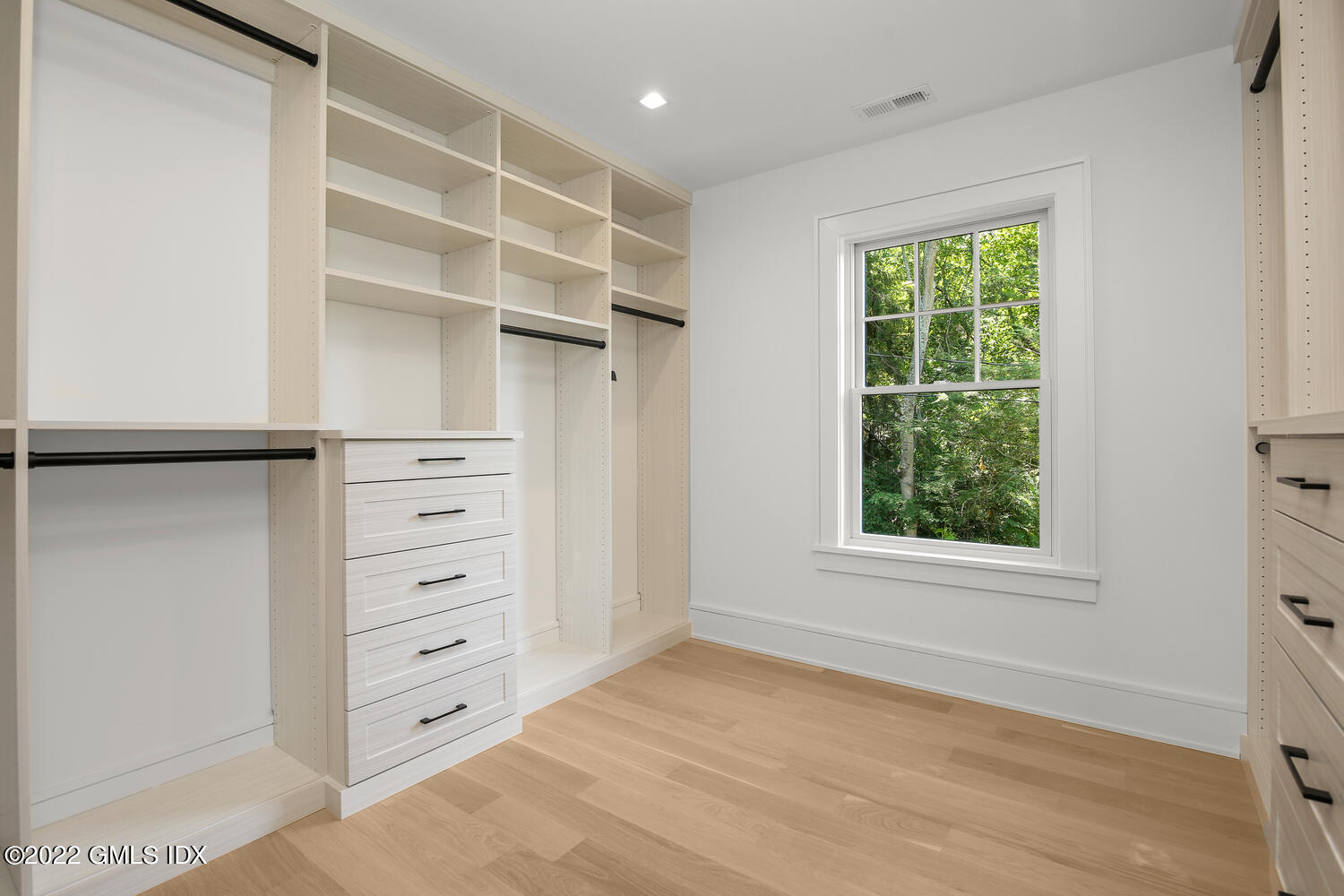 106 Sheep Hill Road Riverside, CT 06878 - Photo 33 of 53 a view of walk in closet with clothes and shoes