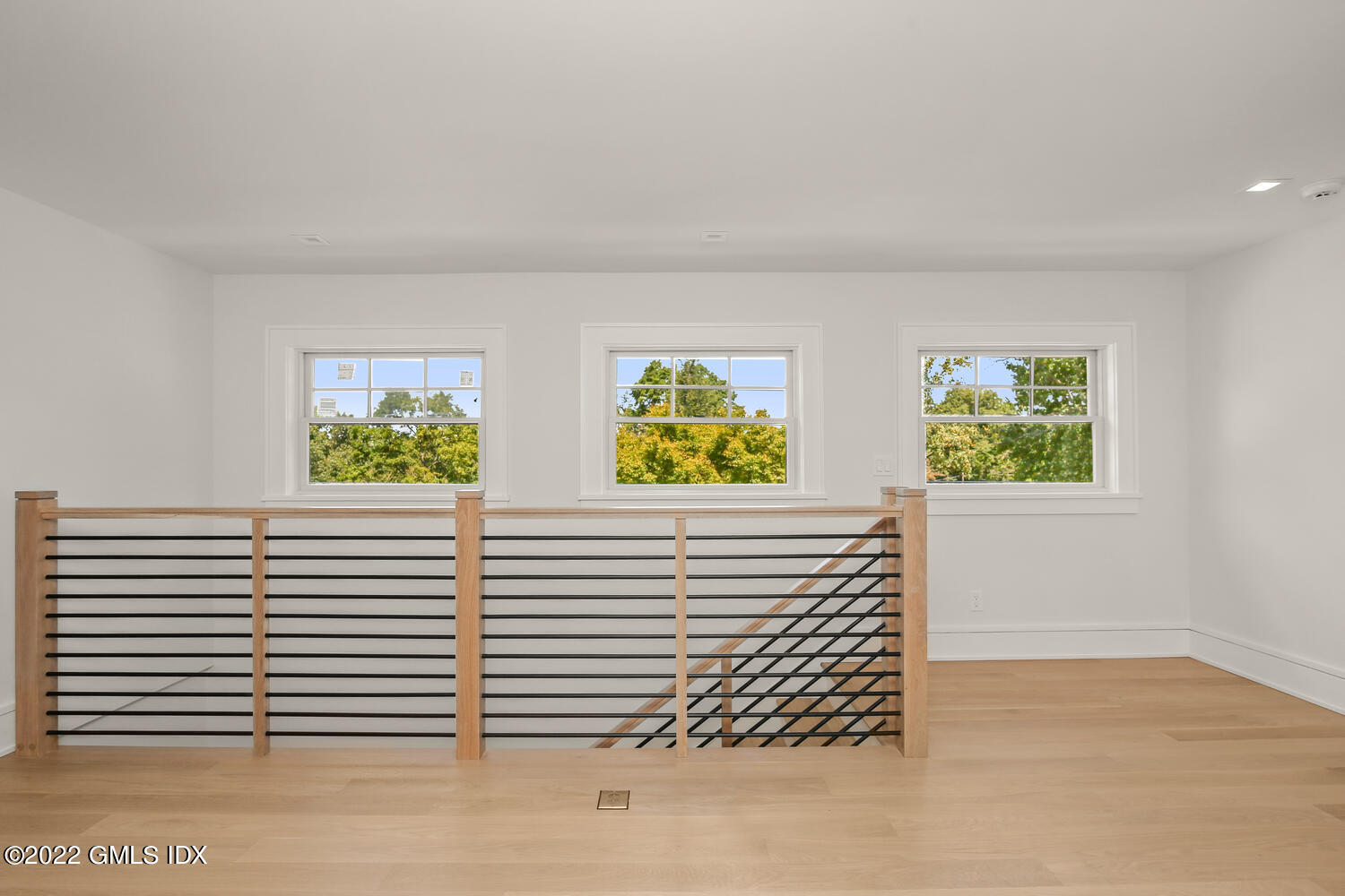 106 Sheep Hill Road Riverside, CT 06878 - Photo 45 of 53 a view of two windows and a chandelier