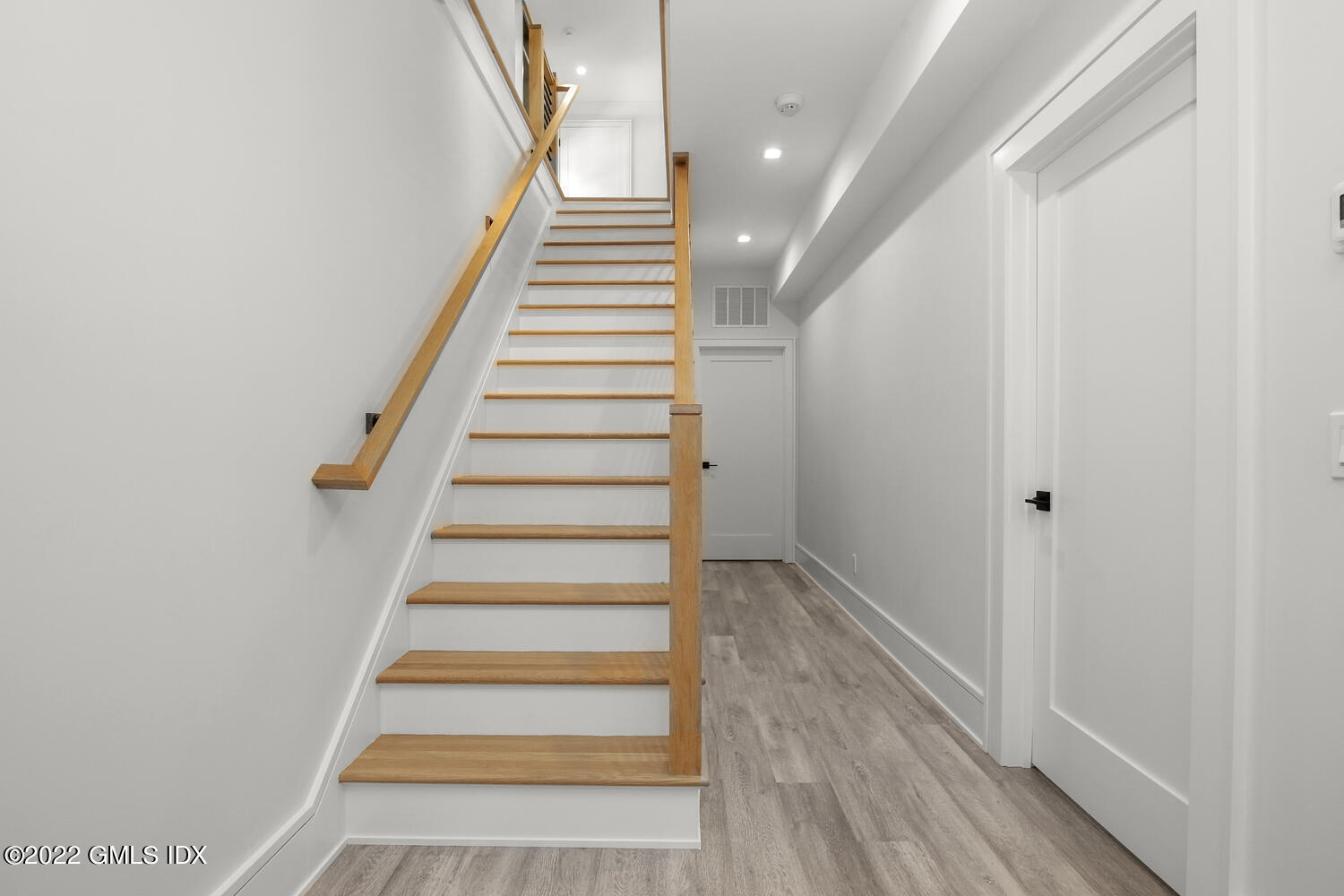 106 Sheep Hill Road Riverside, CT 06878 - Photo 46 of 53 a view of entryway with wooden floor