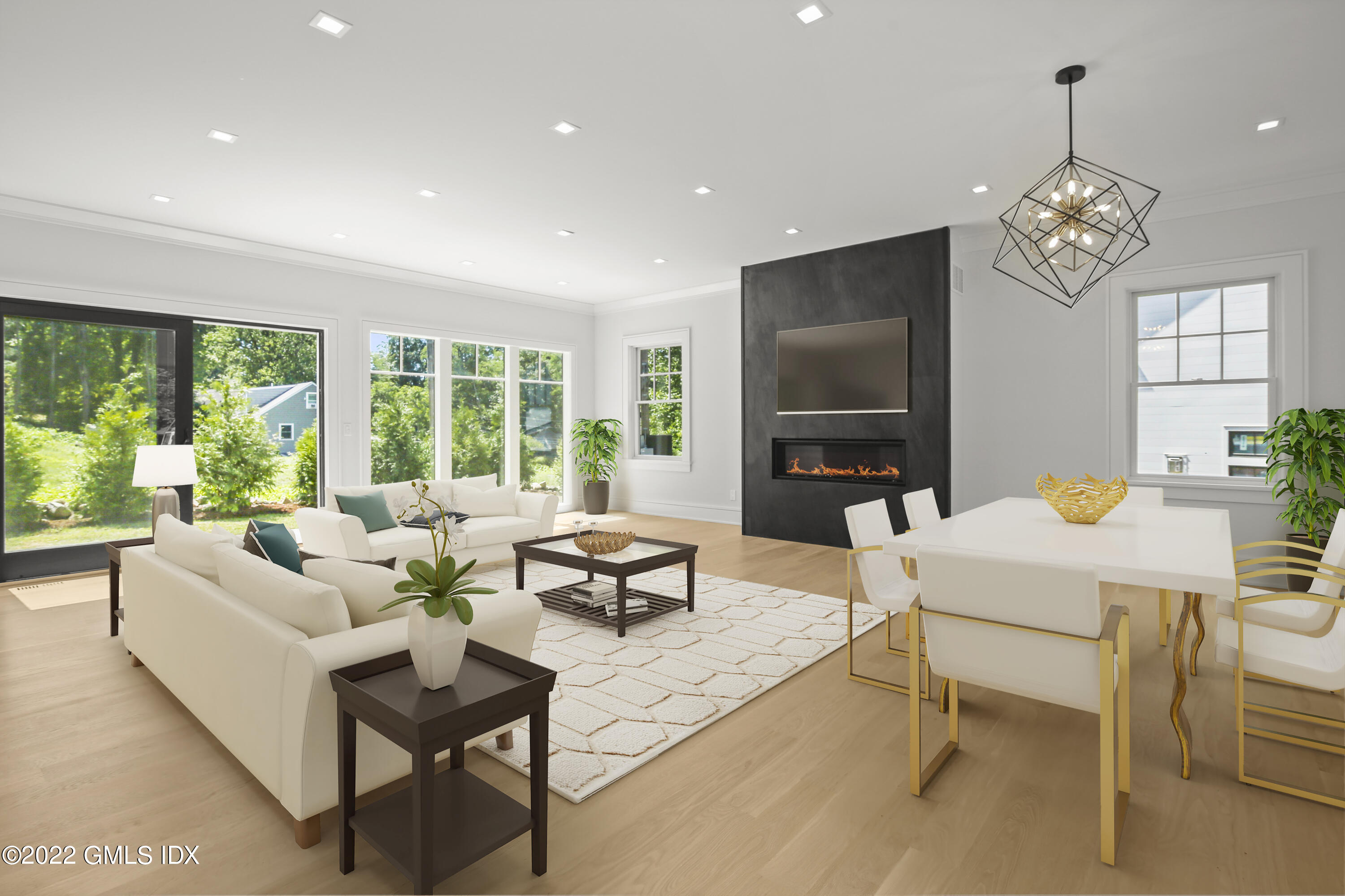 106 Sheep Hill Road Riverside, CT 06878 - Photo 10 of 53 a living room with fireplace furniture and a flat screen tv