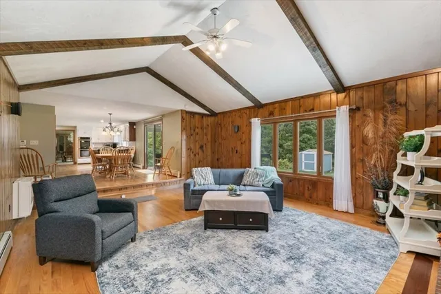 a kitchen with stainless steel appliances granite countertop a stove and a refrigerator