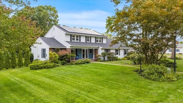 a kitchen with stainless steel appliances granite countertop a stove and a sink