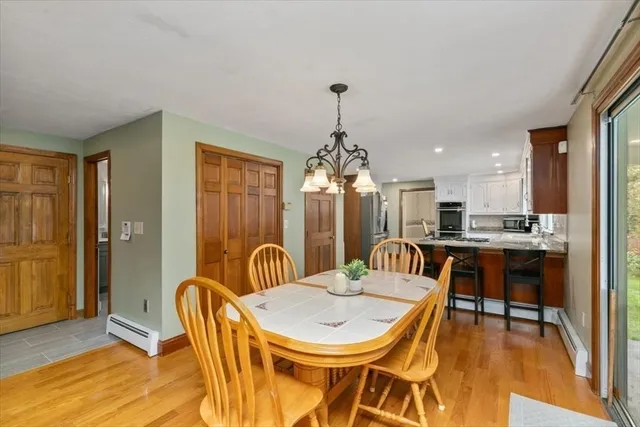 a living room with furniture and a chair
