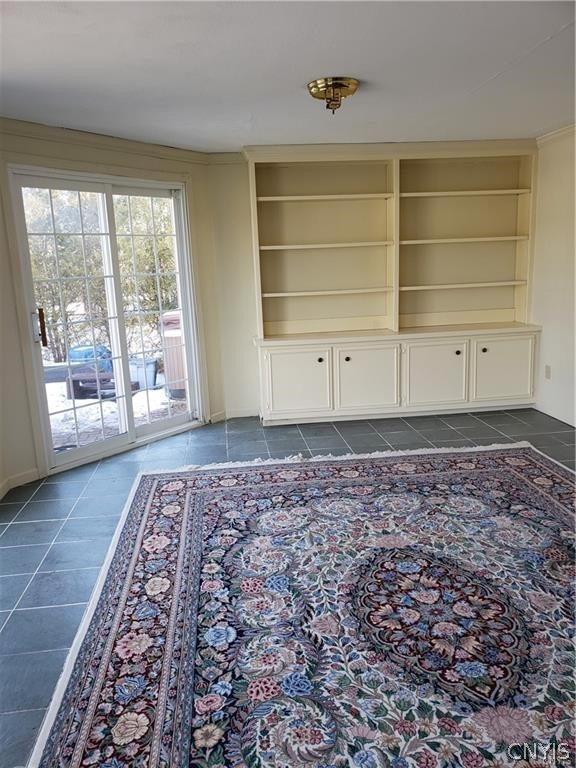 104 Old Lyme Road DeWitt, NY 13224 - Photo 11 of 34 Step into the Florida room with custom built-ins.