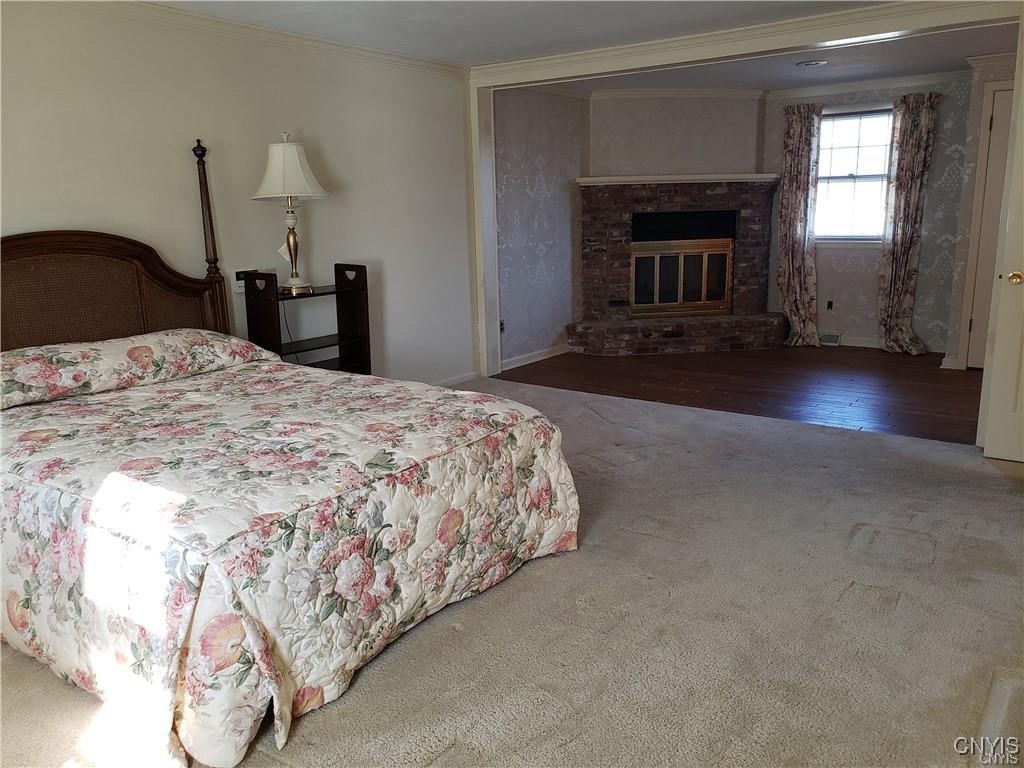 104 Old Lyme Road DeWitt, NY 13224 - Photo 13 of 22 Grand, front-to-back primary suite with fireplace