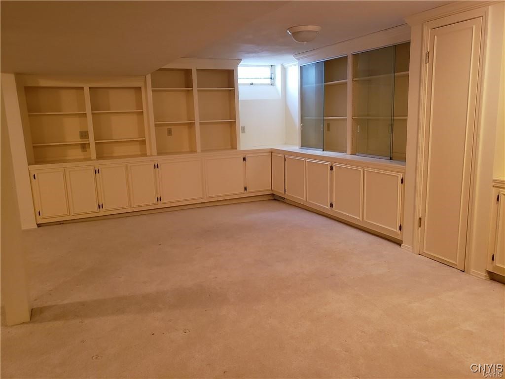 104 Old Lyme Road DeWitt, NY 13224 - Photo 21 of 22 Custom cabinetry, shelving and three cedar closets