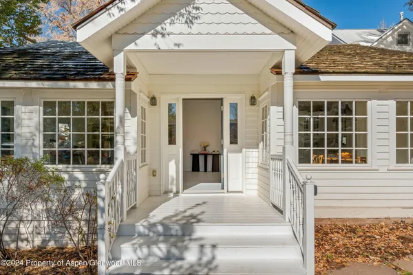 a front view of a house with a porch