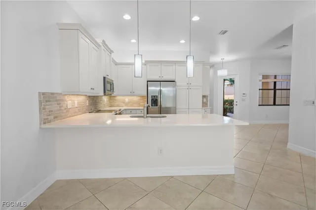 $390,000 | 11944 Five Waters Circle, Fort Myers, FL 33913