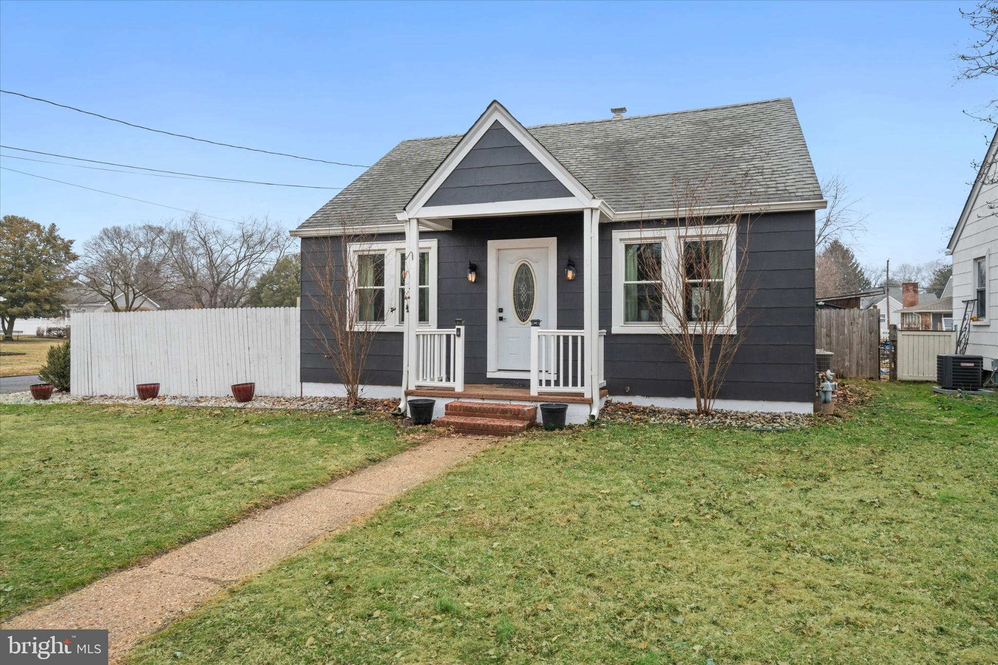 7 2nd Avenue New Castle, DE 19720 - Photo 2 of 44 Charming blue cottage with inviting porch.
