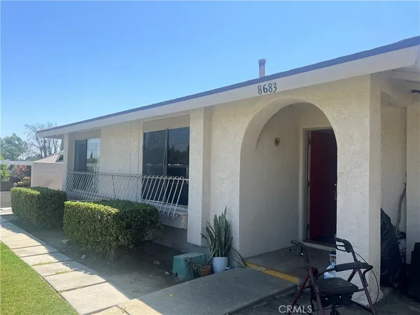 a view of a porch with furniture
