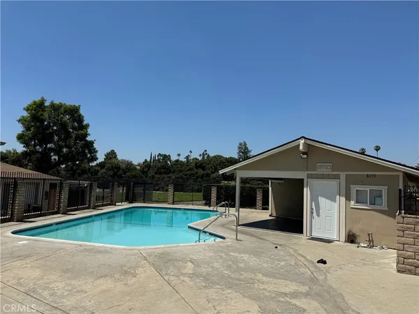 a view of a house with a swimming pool