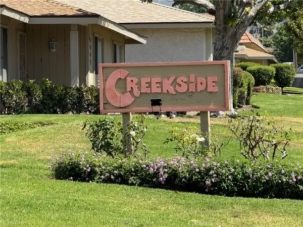 a sign on the side of building