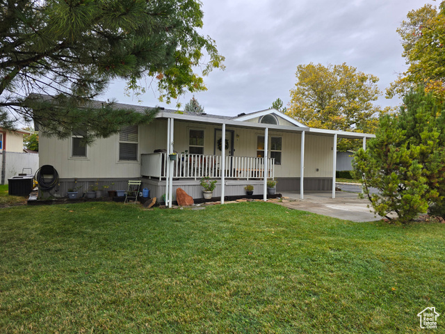 1025 North 300 West, Unit 1 Springville, UT 84663 - Photo 2 of 35 View of front of home featuring a front lawn and a porch