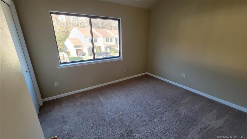 21 Deer Run, Unit 21 Bethel, CT 06801 - Photo 16 of 16 an empty room with a window