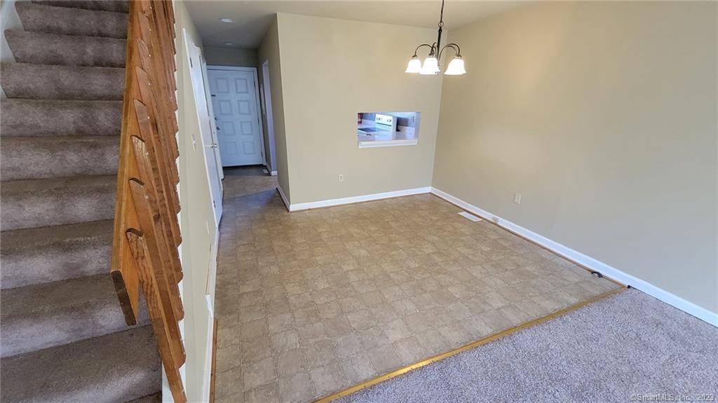 21 Deer Run, Unit 21 Bethel, CT 06801 - Photo 4 of 16 wooden floor in an empty room