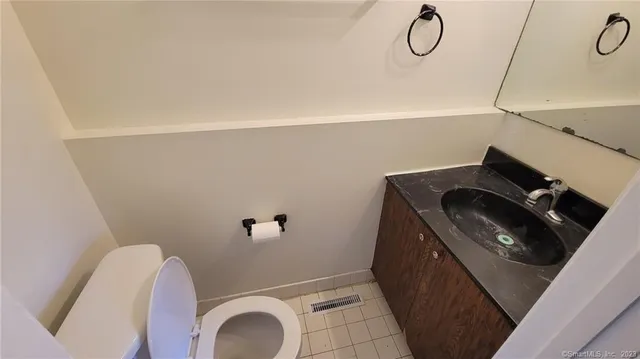 a bathroom with a sink a washer and dryer