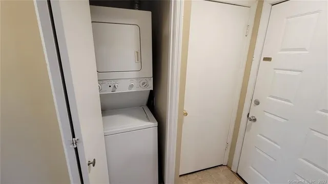 a bathroom with a washer and dryer