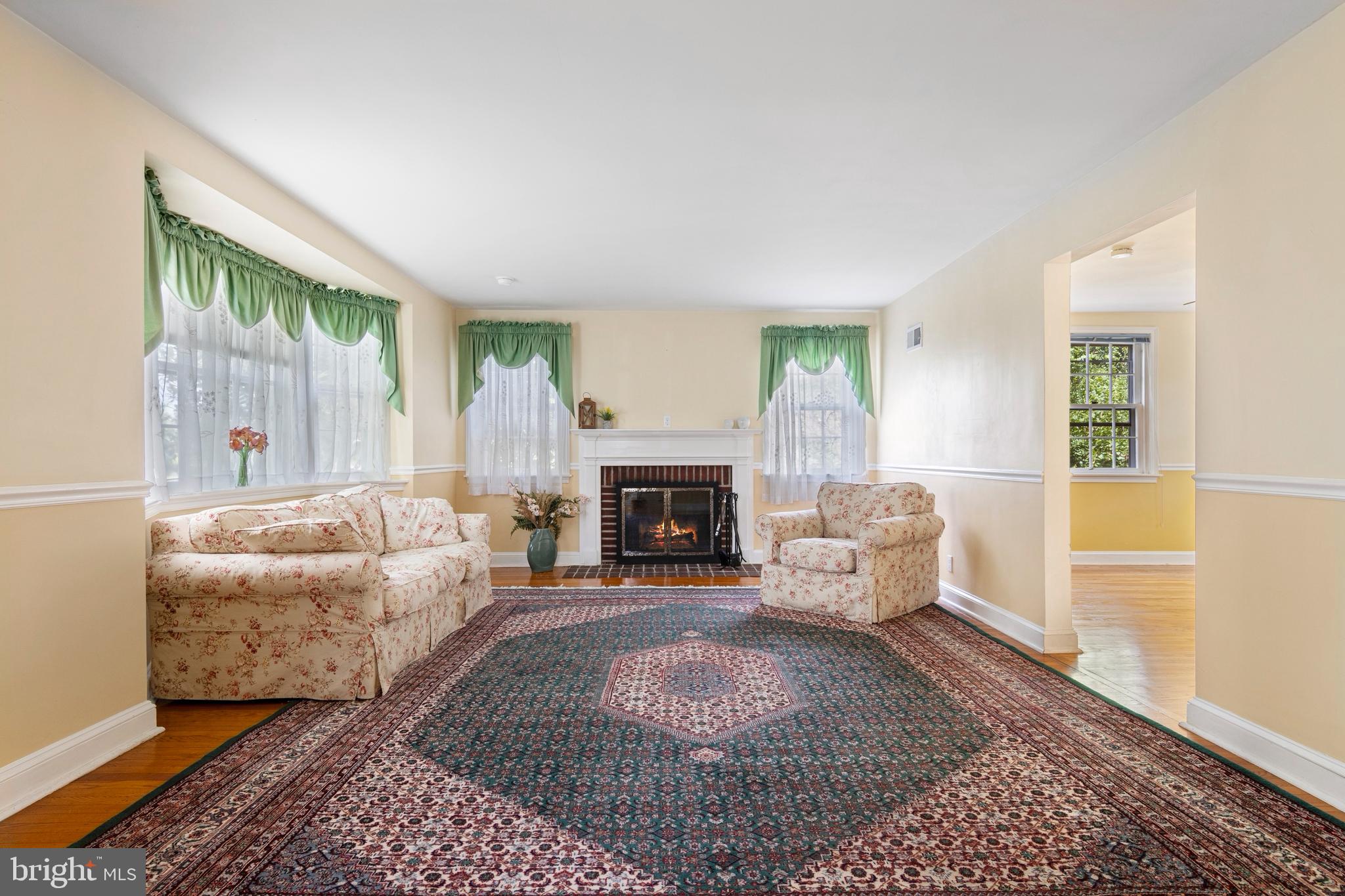 5020 Dermond Road Drexel Hill, PA 19026 - Photo 7 of 39 a living room with furniture and a fireplace