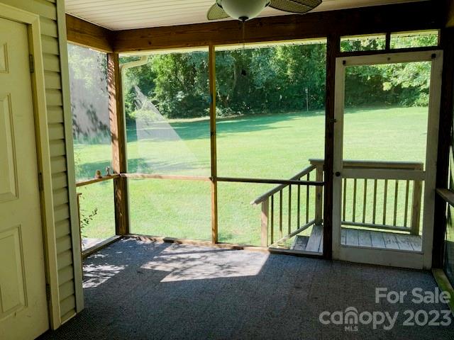 210 South Hillside Street Rutherfordton, NC 28139 - Photo 11 of 48 a view of porch with a floor to ceiling window