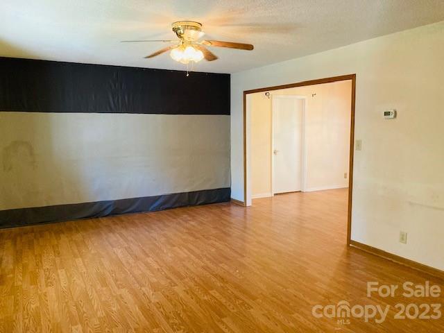 210 South Hillside Street Rutherfordton, NC 28139 - Photo 3 of 48 a view of an empty room with a window