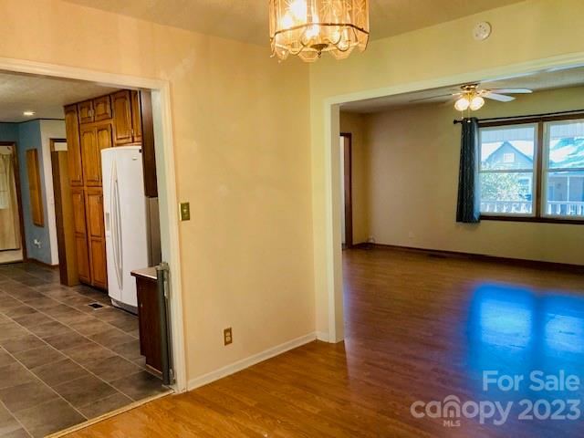 210 South Hillside Street Rutherfordton, NC 28139 - Photo 8 of 48 a view of a room with wooden floor and a window
