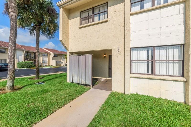 22485 Southwest 61st Way, Unit 136 Boca Raton, FL 33428 - Photo 1 of 15 Front of Townhome