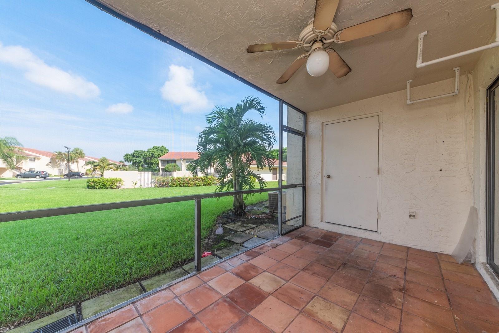 22485 Southwest 61st Way, Unit 136 Boca Raton, FL 33428 - Photo 13 of 15 13_22485SW61stWay136_85_Patio_Custom_Res