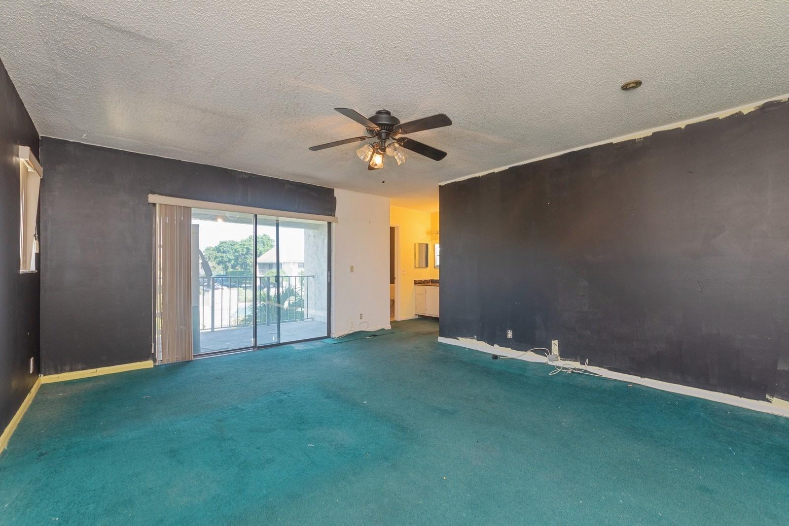 22485 Southwest 61st Way, Unit 136 Boca Raton, FL 33428 - Photo 8 of 15 08_22485SW61stWay136_14_MasterBedroom_Cu