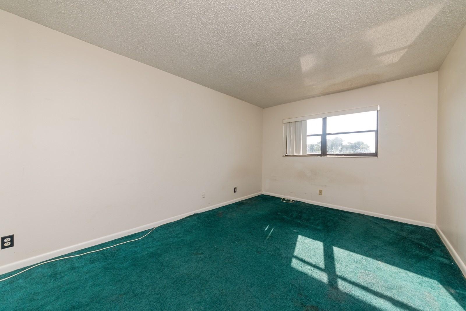22485 Southwest 61st Way, Unit 136 Boca Raton, FL 33428 - Photo 10 of 15 10_22485SW61stWay136_154_3rdBedroom_Cust