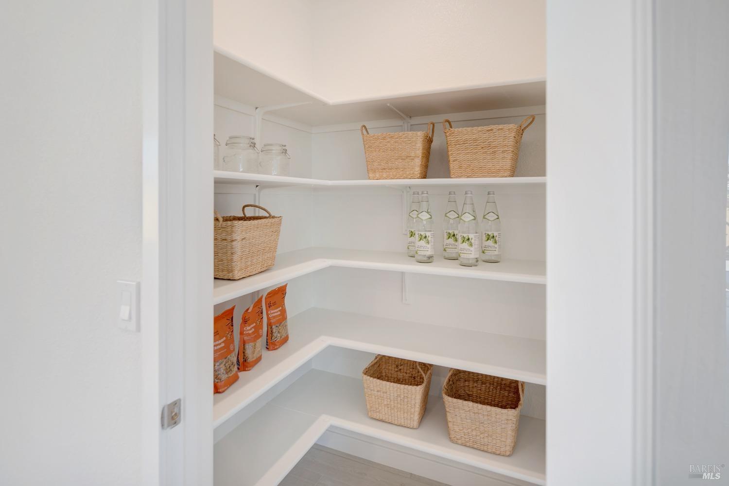 2438 Revival Lane Rio Vista, CA 94571 - Photo 14 of 40 a hallway with white cabinets