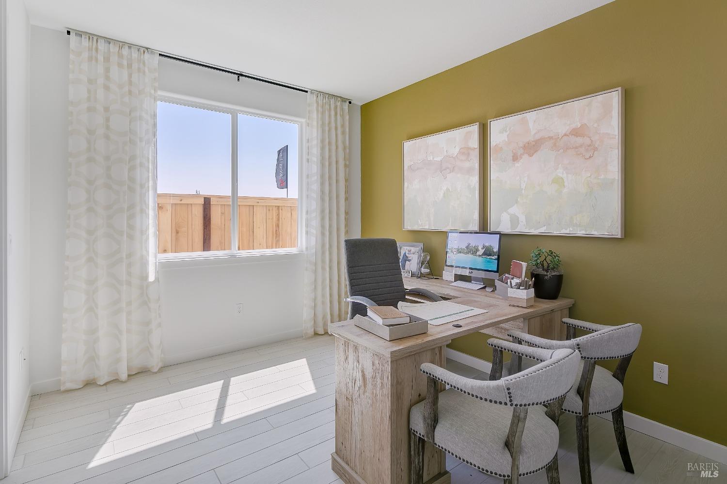 2438 Revival Lane Rio Vista, CA 94571 - Photo 18 of 40 a view of a workspace with furniture and a window