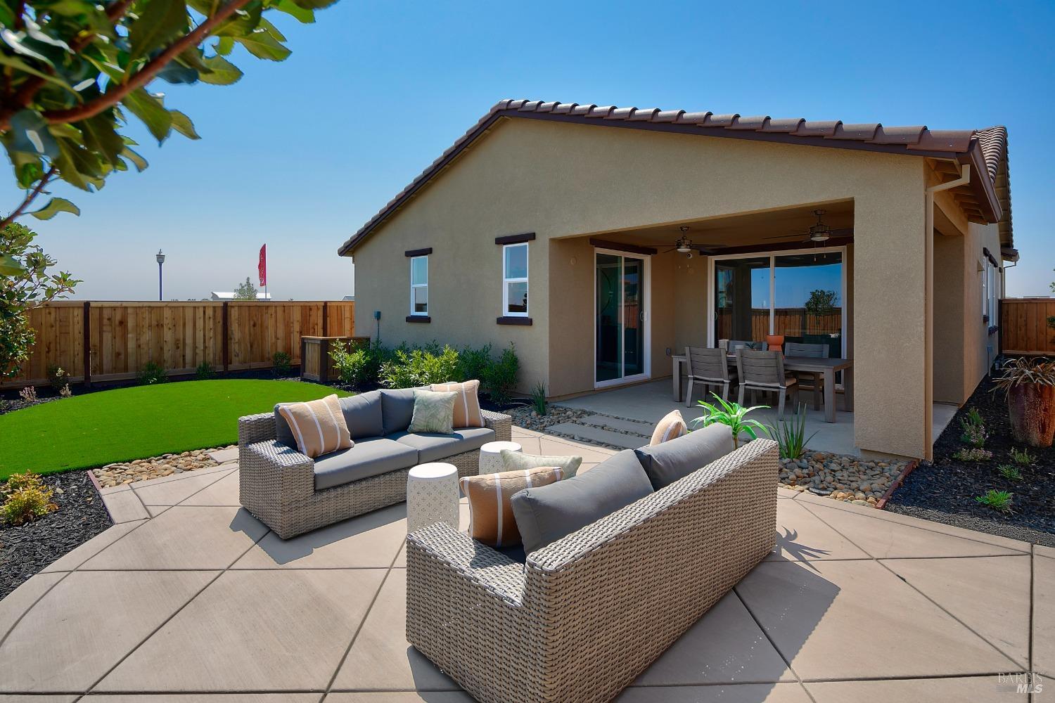 2438 Revival Lane Rio Vista, CA 94571 - Photo 32 of 40 a view of a house with couches and a big yard