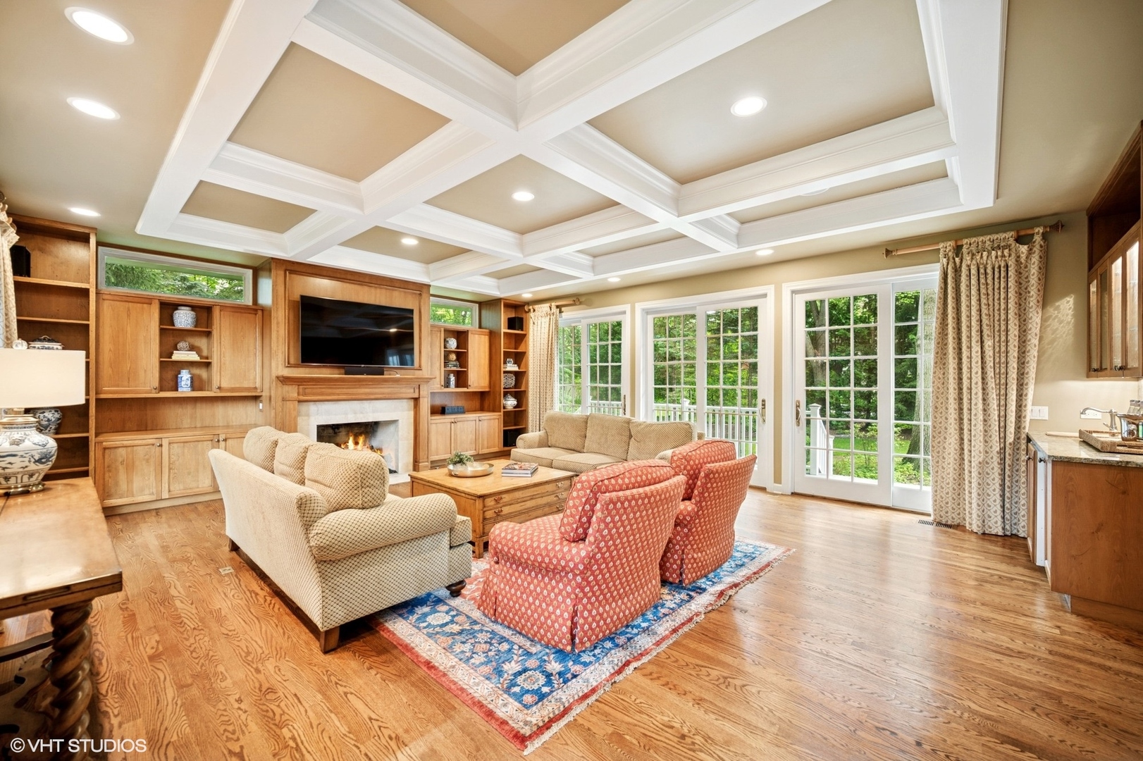 1118 Mt Pleasant Road Winnetka, IL 60093 - Photo 13 of 48 a living room with furniture and a flat screen tv