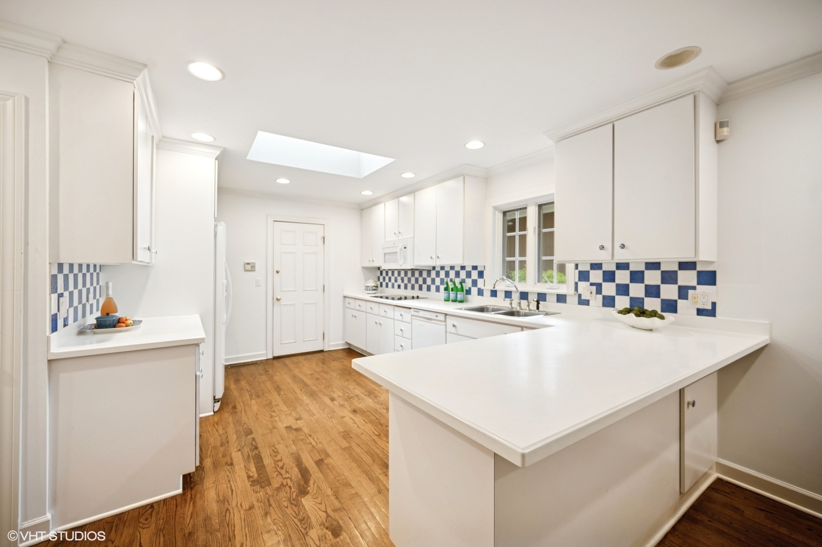 1118 Mt Pleasant Road Winnetka, IL 60093 - Photo 21 of 48 a view of kitchen with center island and stainless steel appliances