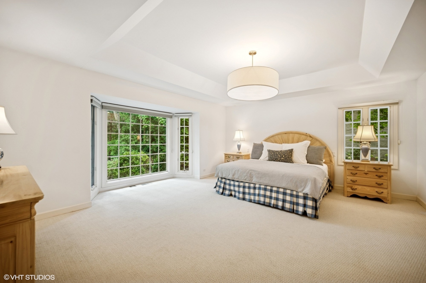 1118 Mt Pleasant Road Winnetka, IL 60093 - Photo 24 of 48 a bedroom with a large bed and a large window