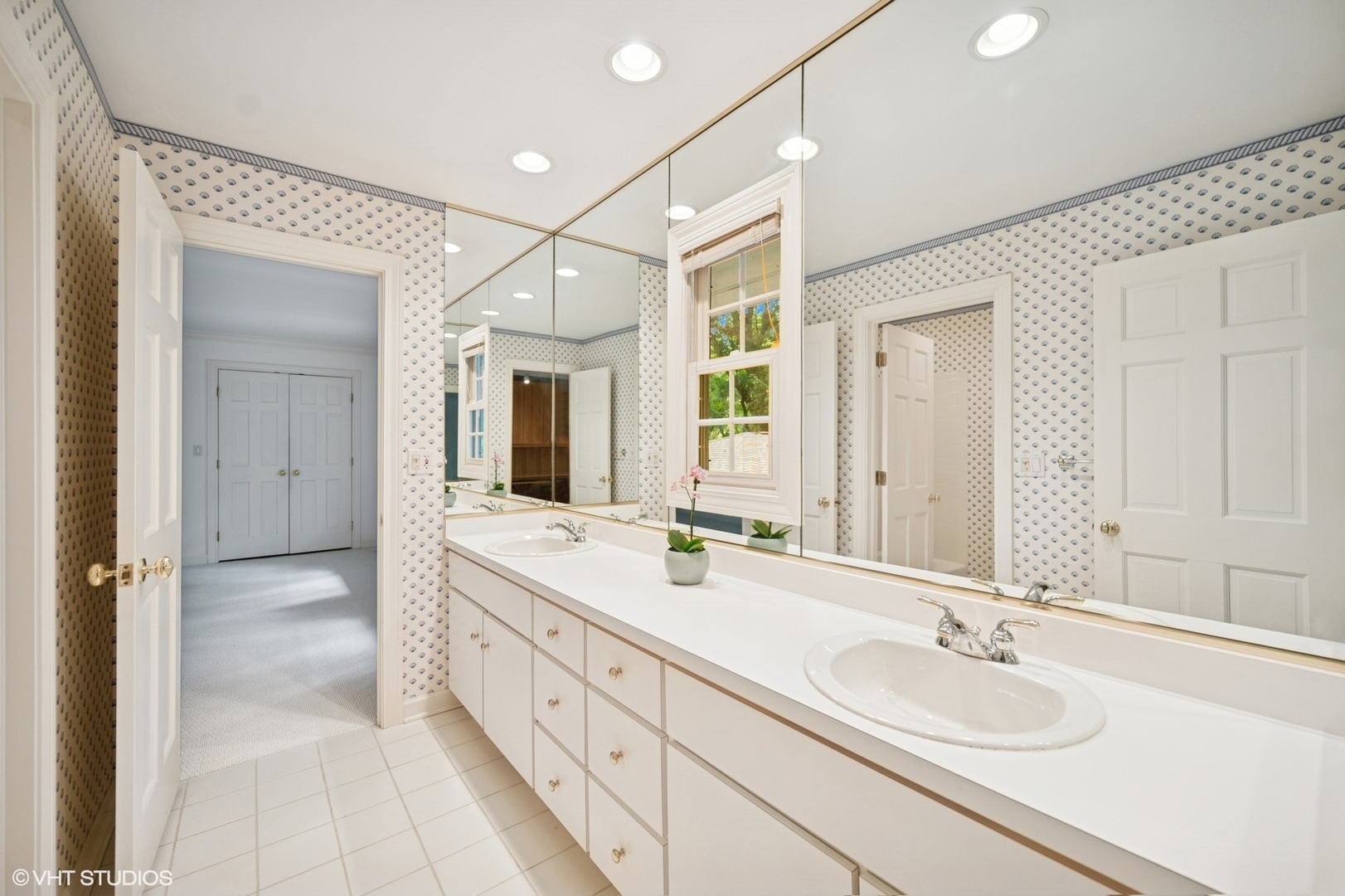 1118 Mt Pleasant Road Winnetka, IL 60093 - Photo 31 of 48 a spacious bathroom with a double vanity sink mirror and double