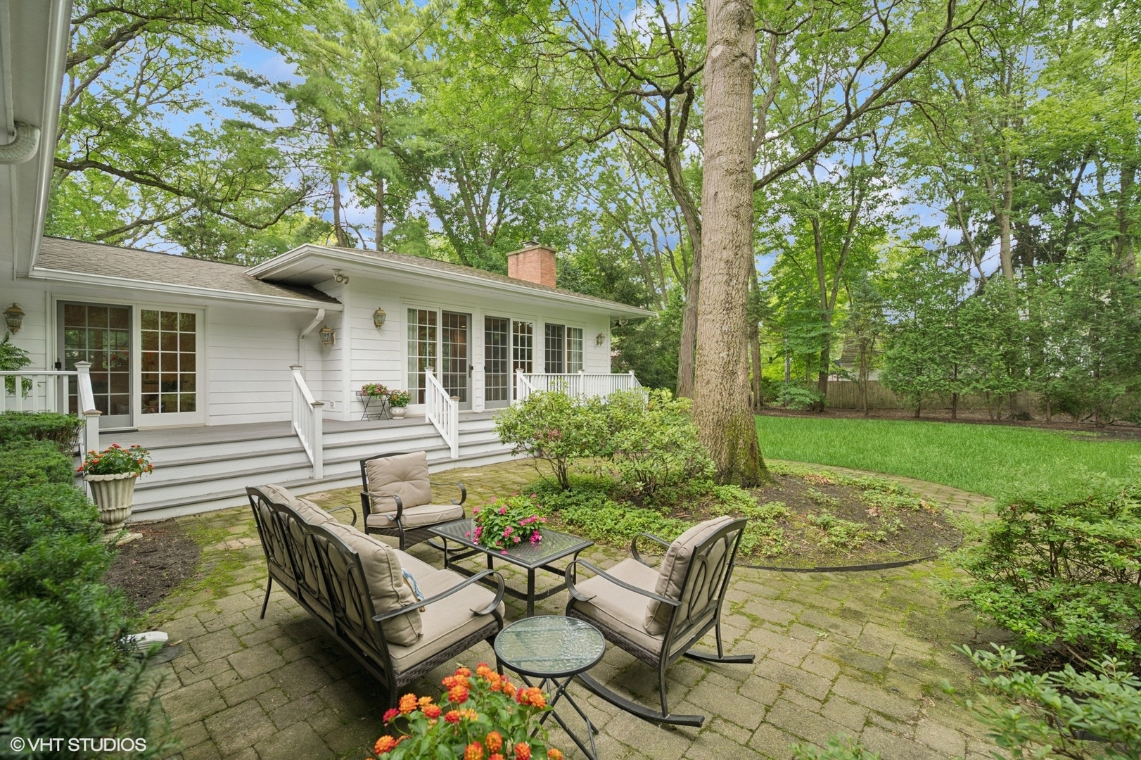 1118 Mt Pleasant Road Winnetka, IL 60093 - Photo 42 of 48 a view of house with backyard outdoor seating and green space