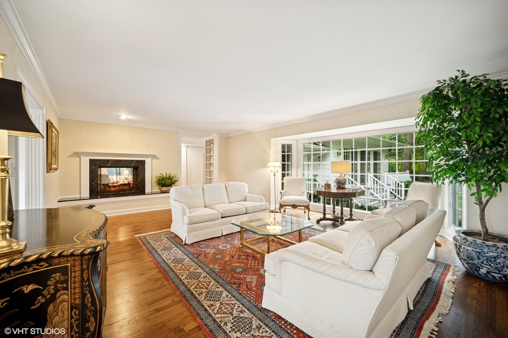 1118 Mt Pleasant Road Winnetka, IL 60093 - Photo 8 of 48 a living room with furniture and a flat screen tv