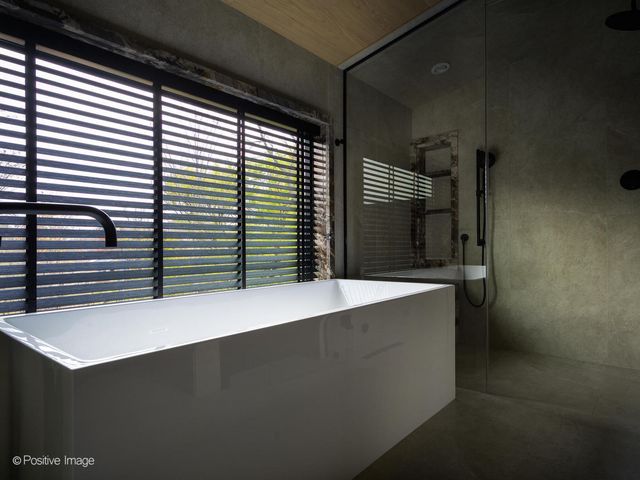 a kitchen with a sink cabinets and window
