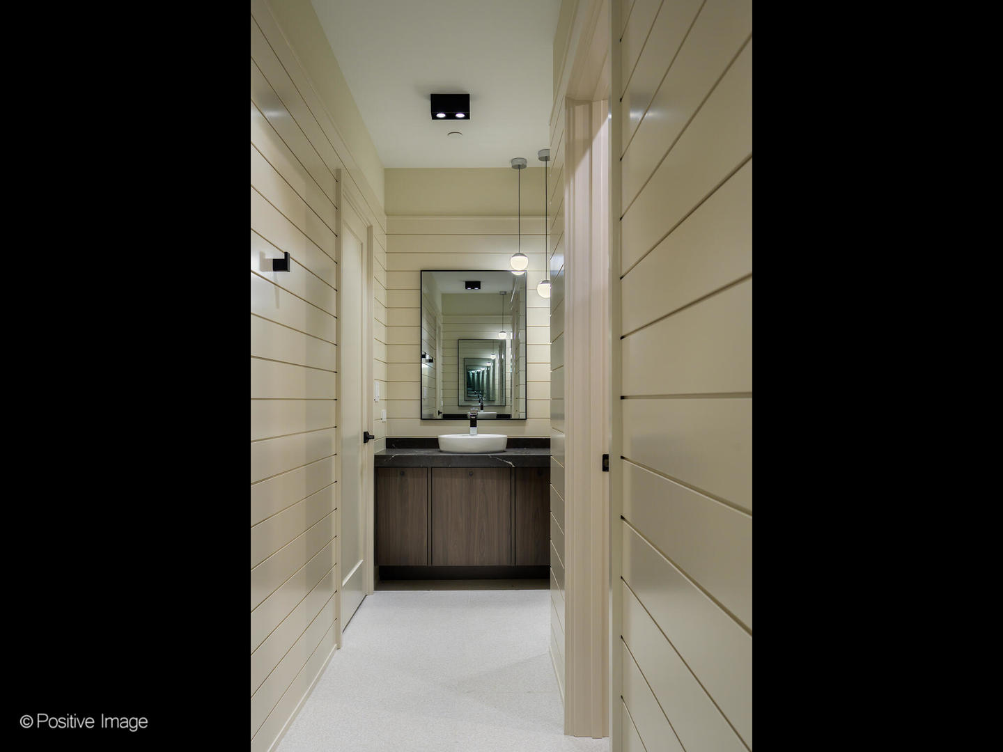 1106 Hohlfelder Road Glencoe, IL 60022 - Photo 40 of 61 a bathroom with a granite countertop sink a large mirror and a bathtub