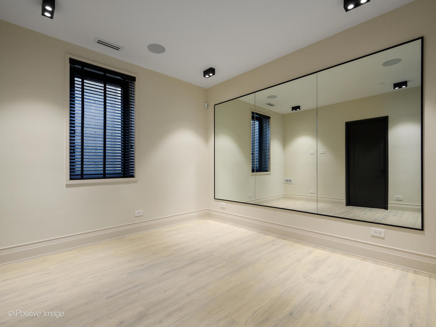 1106 Hohlfelder Road Glencoe, IL 60022 - Photo 47 of 61 a view of an empty room with window and mirror
