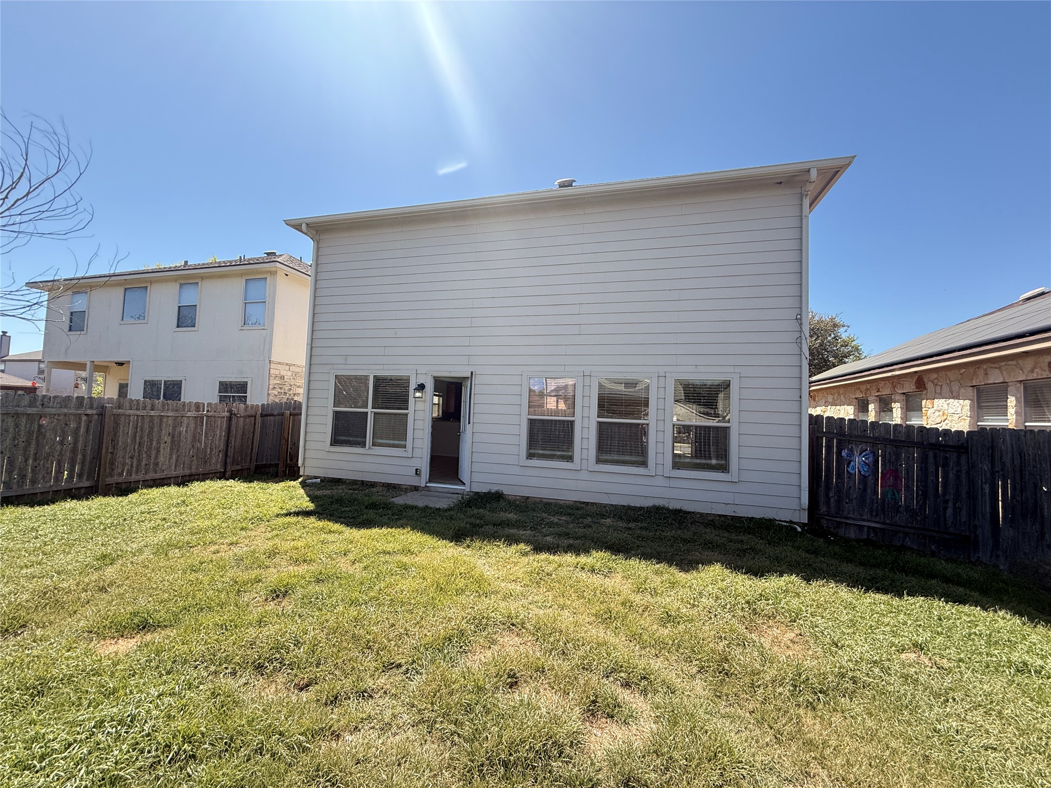 279 Housefinch Loop Leander, TX 78641 - Photo 30 of 30 Back of house featuring a fenced backyard