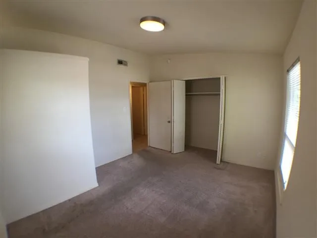 a view of a window in an empty room