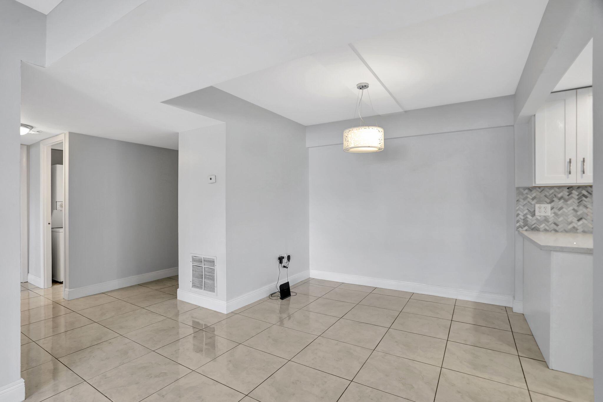 4156 Inverrary Drive, Unit 111 Lauderhill, FL 33319 - Photo 3 of 18 a view of an empty room and window