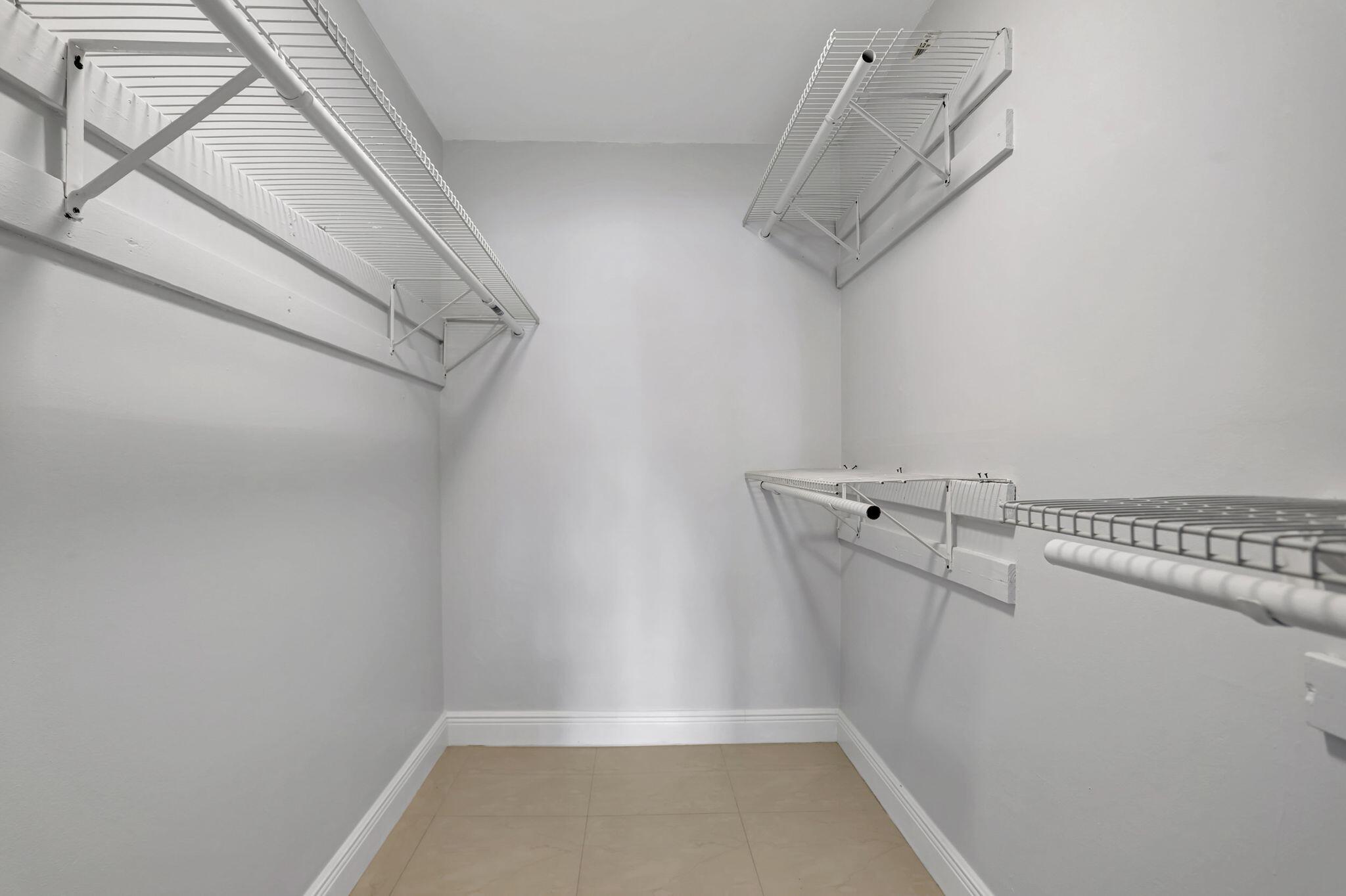 4156 Inverrary Drive, Unit 111 Lauderhill, FL 33319 - Photo 9 of 18 a view of a room with racks on the wall