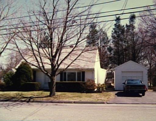 35 Broadmere Road Stratford, CT 06614 - Photo 1 of 1 a view of a house with a yard and garage